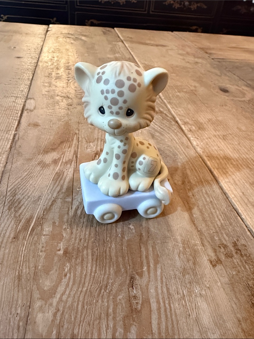 Precious Moments Cream Spotted Leopard on Light Purple Wheeled Base